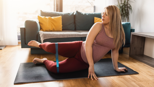 woman trying out new stretches to improve her motion